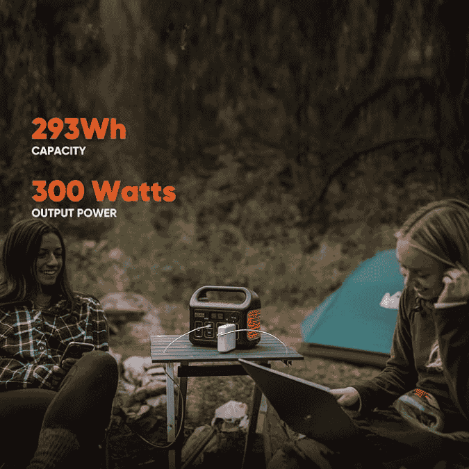 Jackery Explorer 300 output ports powering a phone, laptop and other small devices